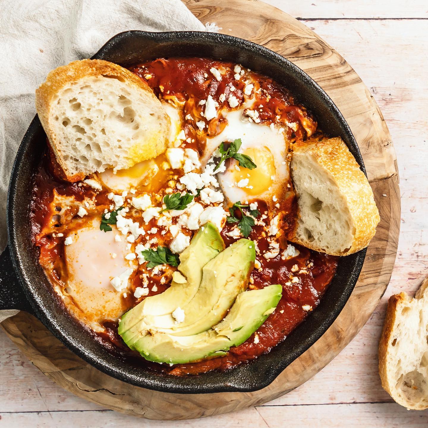 Here’s my super speedy 20minute Shakshuka recipe! Topped with avocado slices and crumbled feta. Served with chunky slices of sourdough! Perfect for weekend brunch 😍. Hit SAVE to give this a try 💛

Serve 2
Ready in 20 minutes

INGREDIENTS

1/2 tbsp olive oil
100g cherry tomatoes, halved
440g Tomato and basil pasta sauce (I used ZenB)
3 free range eggs
20g feta cheese
1 avocado, sliced
Sourdough slices, to serve

METHOD

1. Heat the olive oil in a small skillet or frying pan, add the cherry tomatoes and cook for 5 minutes until softened. Pour in the pasta sauce and stir through.
2. Make three wells in the sauce and crack in the eggs. Cover the pan with a lid and cook for 5-7 minutes until the egg white is starting to set and the yolk is gooey.
3. Place onto a serving board, crumble over the feta cheese and top with slices of avocado. Serve with fresh slices of sourdough bread for dipping.